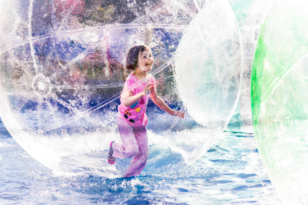 istock Girl Running in Ball 923491416
