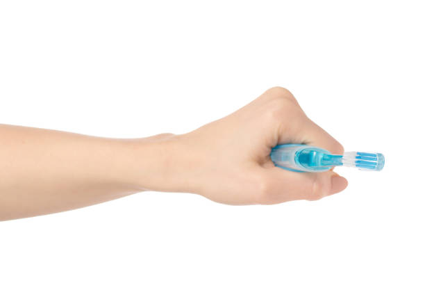 istock Travel blue toothbrush in hand 923497320