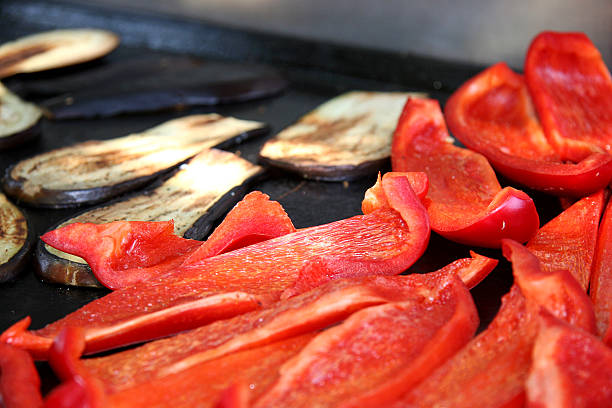 Grilled aubergines and peppers. stock photo