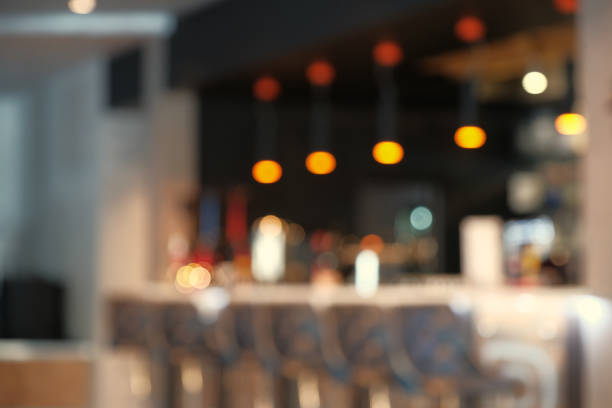 istock Blurry image of a cafe interrior background with bokeh 923501408