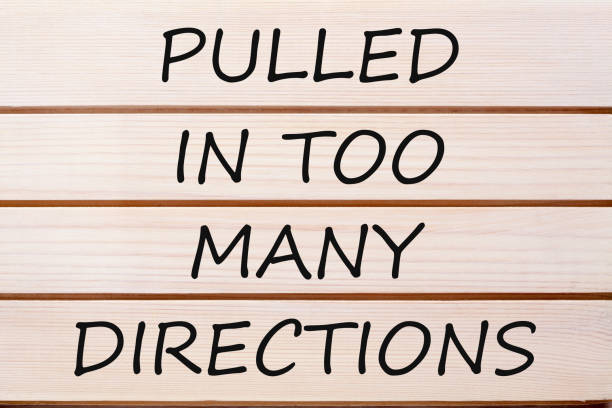istock Pulled in Too Many Directions Concept of Stress 923505184