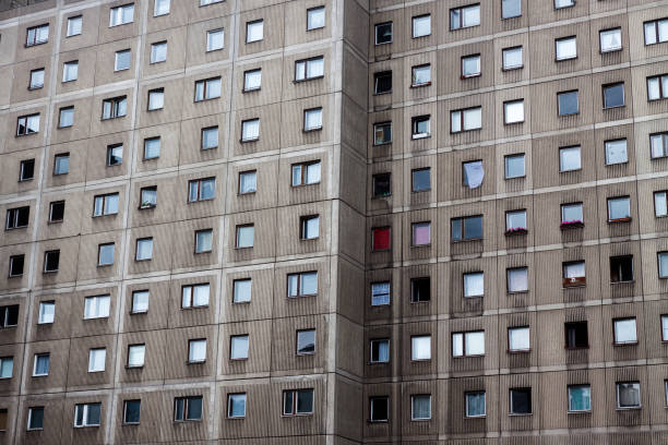 Facade of a typical soviet-era pre-fabricated concrete apartment building in Berlin, Germany, also known as Plattenbau.