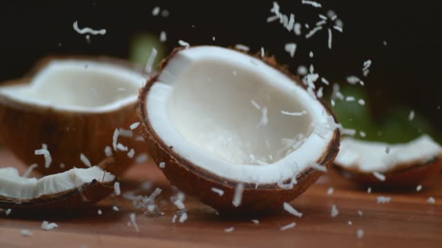 Shredded Coconut falling in super slow motion