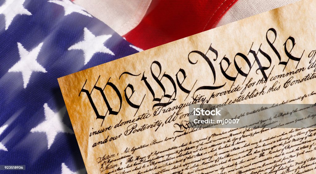 We the People. Constitution of America, We the People with American flag. Constitution Stock Photo