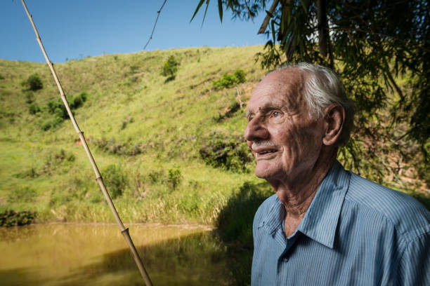 istock 80 years old farmer fishing 923519316