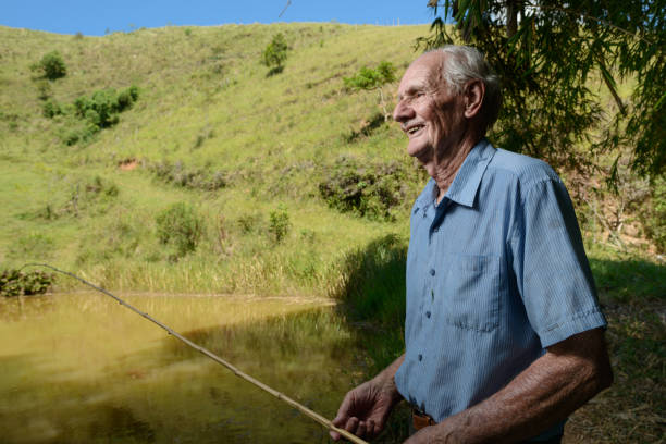 istock 80 years old farmer fishing 923519324
