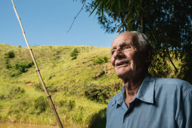 istock 80 years old farmer fishing 923519336