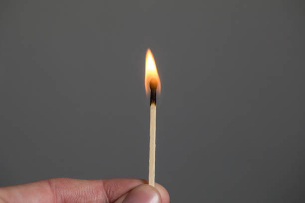 Match In A Hand Burning stock photo