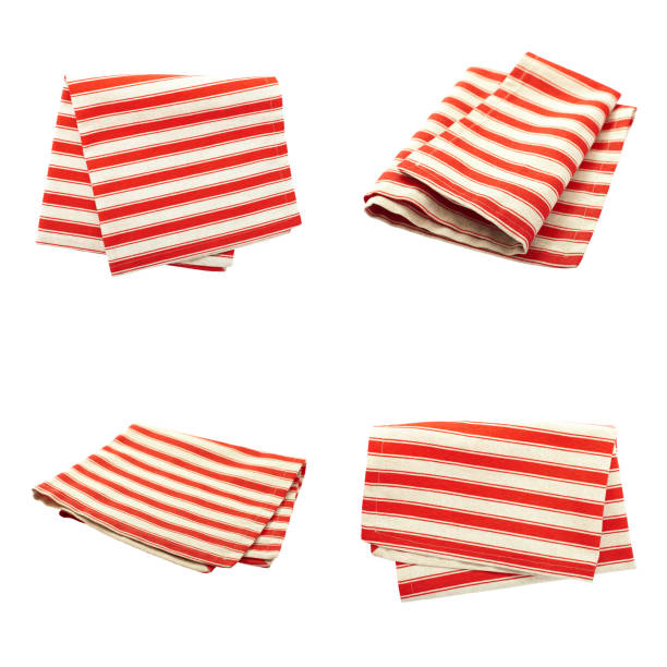 istock Set stack of colorful dish towels isolated on white. Multi-colored linen napkins for restaurant. Flat mock up for design. Top view 923529896