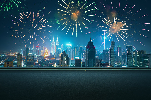 Celebrate New Year's fireworks with skyscrapers along the Chao Phraya River in Bangkok Thailand