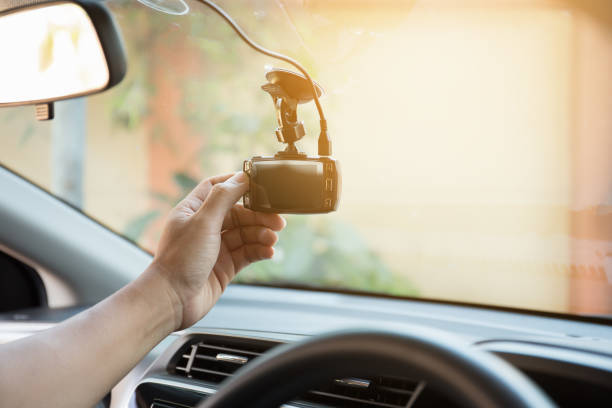 istock Close up of human hand push button for record video in car 923538656