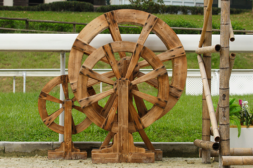 Medieval wooden wheel from a cast-iron cannon. Herceg Novi, Montenegro. Naval artillery, artillery gun. Ancient chariot wheels and cannons made of wood