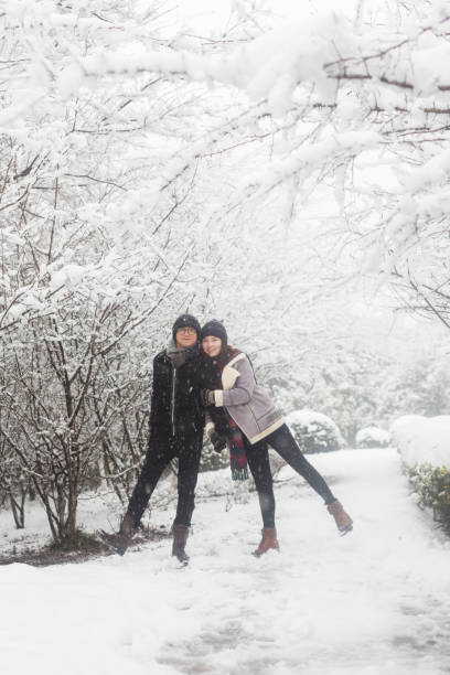 istock affectionate couple standing in winter landscape 923546188