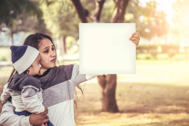 mother and daughter outdoors in a meadow. - outdoors playing family spring imagens e fotografias de stock