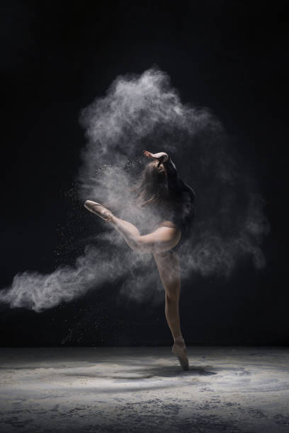 istock Woman in undrewear in dust cloud profile shot 923556270