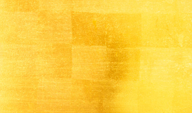 istock Shiny yellow leaf gold foil texture 923556378