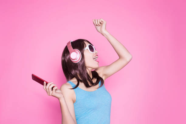 istock woman use phone listen music 923559830