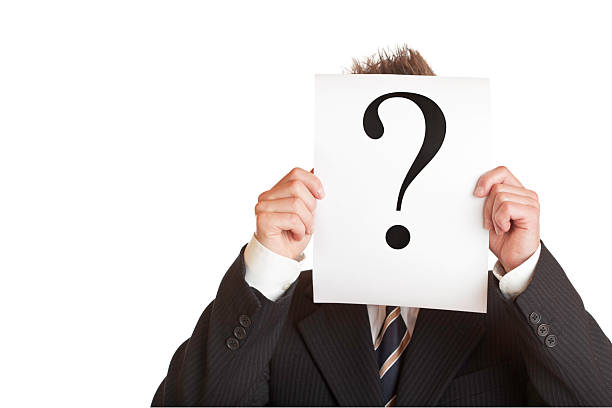 istock Businessman holds sign with a question mark 92356778