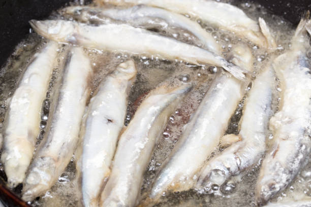 istock capelin in the flour fried in a pan 923573688