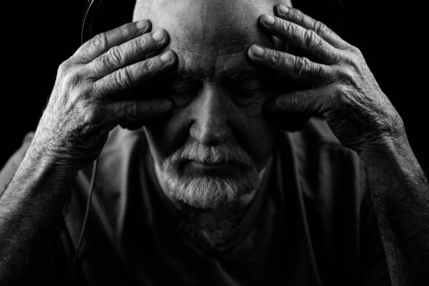 istock Senior man listening to music 923574490
