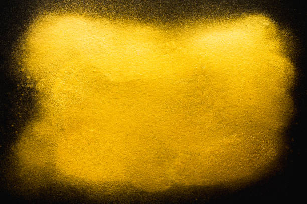 istock Golden abstract grainy texture on black background 923575126