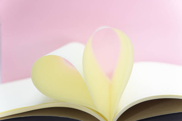 istock The page in the book is folded into a heart shape 923577778