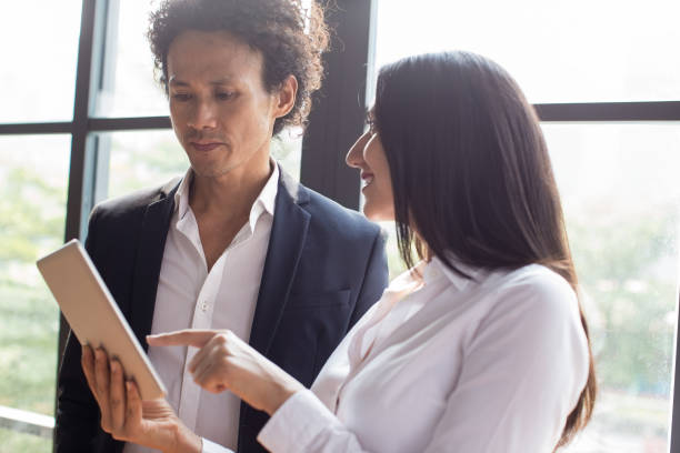 istock Business executives discussing financial analysis 923582086
