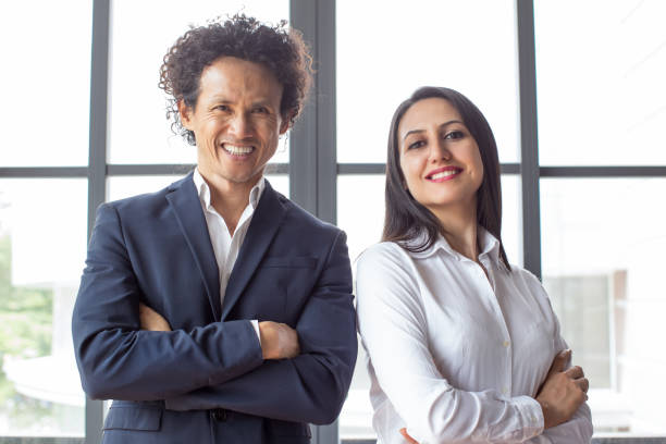 istock Happy multiethnic entrepreneurs looking at camera 923582124