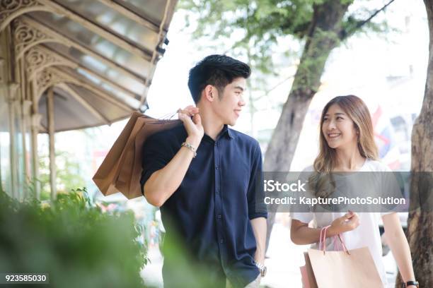 Young Asian Couple Going Out For Shopping Stock Photo - Download Image Now - Shopping, Retail, Couple - Relationship