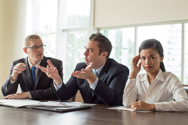 istock Three Business Colleagues at Meeting Room 923588306