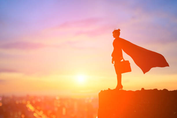 istock super business woman on mountain 923588318