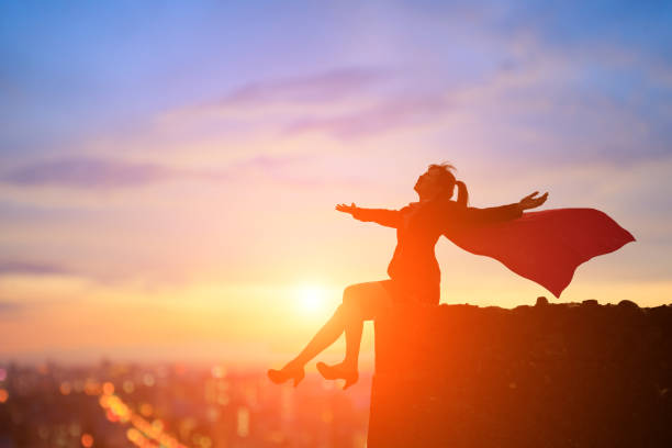 istock super business woman on mountain 923588446