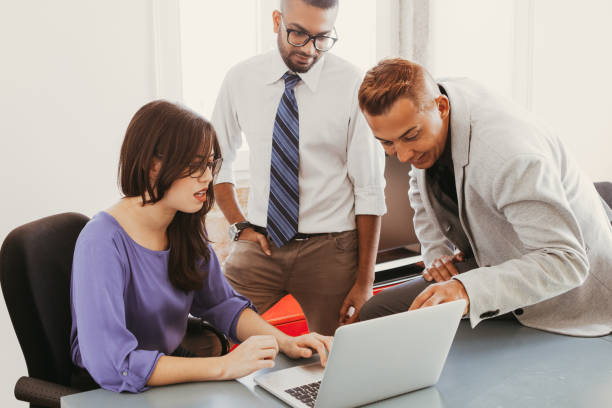 istock Young employees arguing about strategy at meeting 923590166