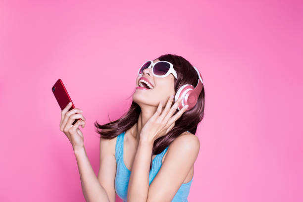 istock woman use phone listen music 923596852