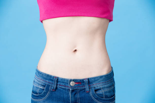 istock close up woman waist 923597502