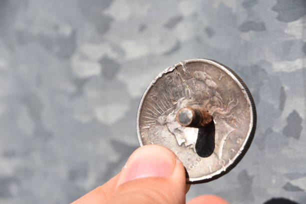 istock Life saving coin , coin that stopped a bullet 923598054
