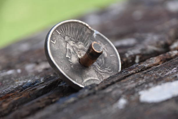 istock Life saving coin , coin that stopped a bullet 923598198