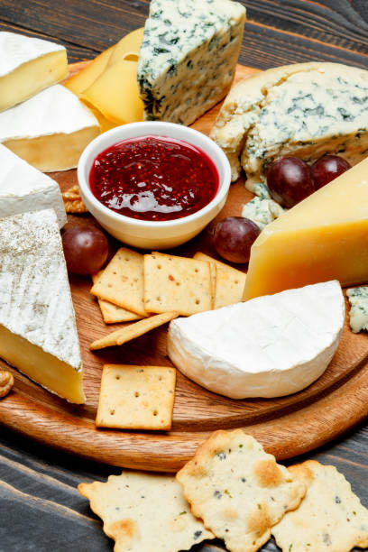 istock Various types of cheese - parmesan, brie, roquefort, cheddar 923601446