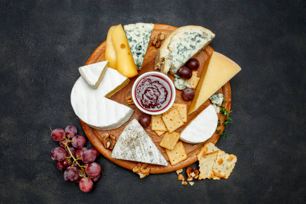 istock Various types of cheese - parmesan, brie, roquefort, cheddar 923601550