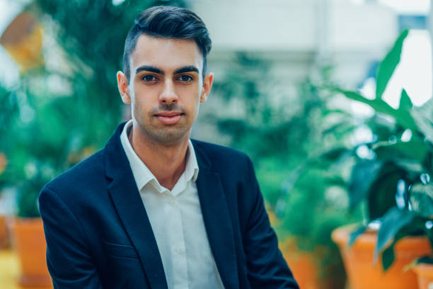 istock Portrait of confident handsome manager in suit 923602034