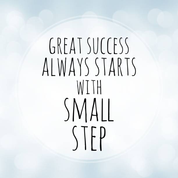 Great success always starts with small step - motivation quote on white bokeh background