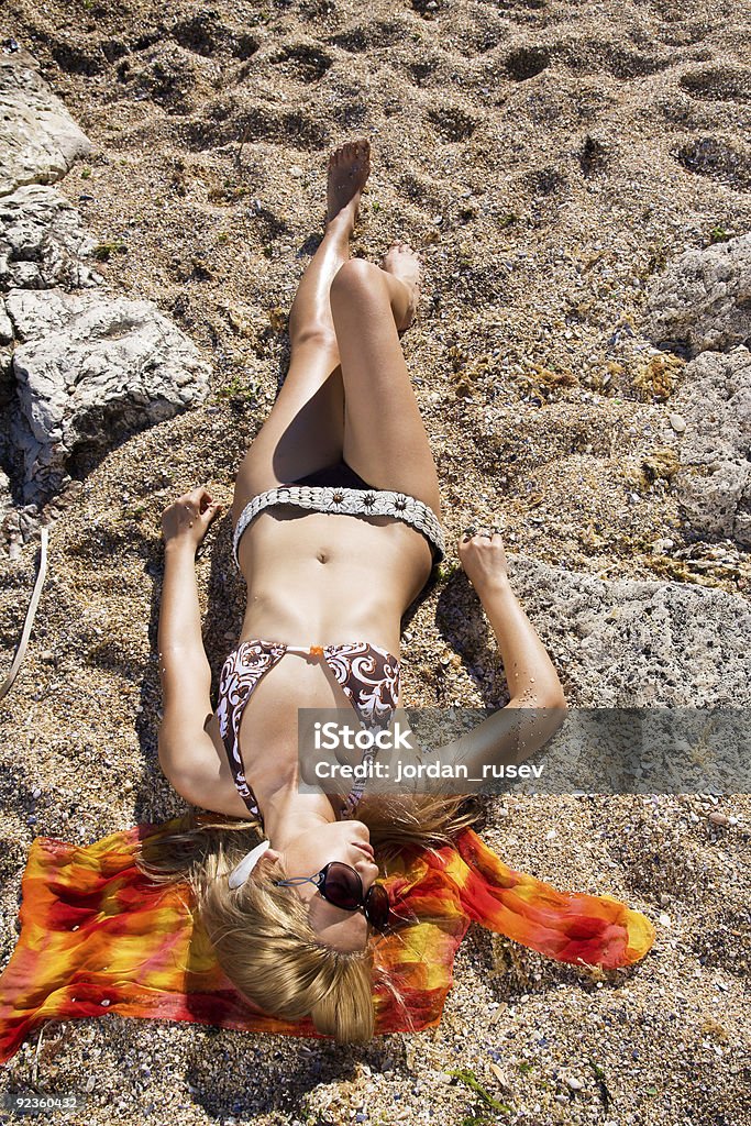 Girl sunbathing  Adult Stock Photo