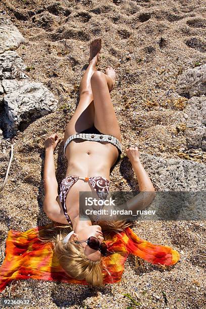 Girl Sunbathing Stock Photo - Download Image Now - Adult, Bay of Water, Beach