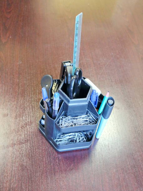 istock DRIVER OF SHEARS, STRIPS, PENCILS on the office table 923605530