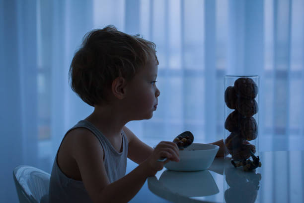 istock A little boy have a breakfast in early morning. 923605800