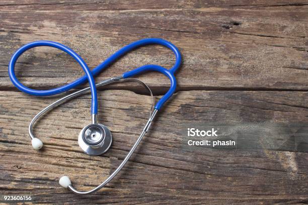 Stethoscope On Wooden Health Background Concept Stock Photo - Download Image Now - Rural Scene, Healthcare And Medicine, Doctor