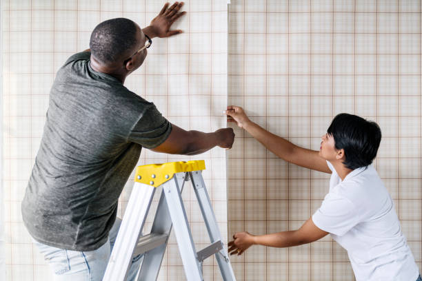 istock Couple decorating new house 923608542