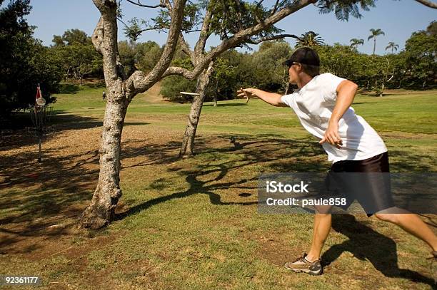 Putting Stock Photo - Download Image Now - Disc Golf, Plastic Disc, Throwing