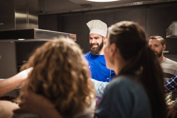 istock People in a cooking class enjoying their time 923613800