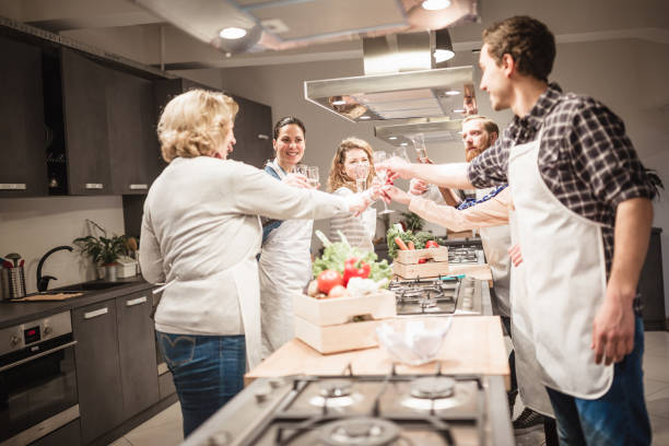 istock People in a cooking class enjoying their time 923613894